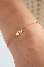 tulpen armband - goud - gedragen om de arm van een model