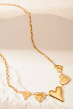 give me all your love ketting - goud - op een ondergrond neergelegd