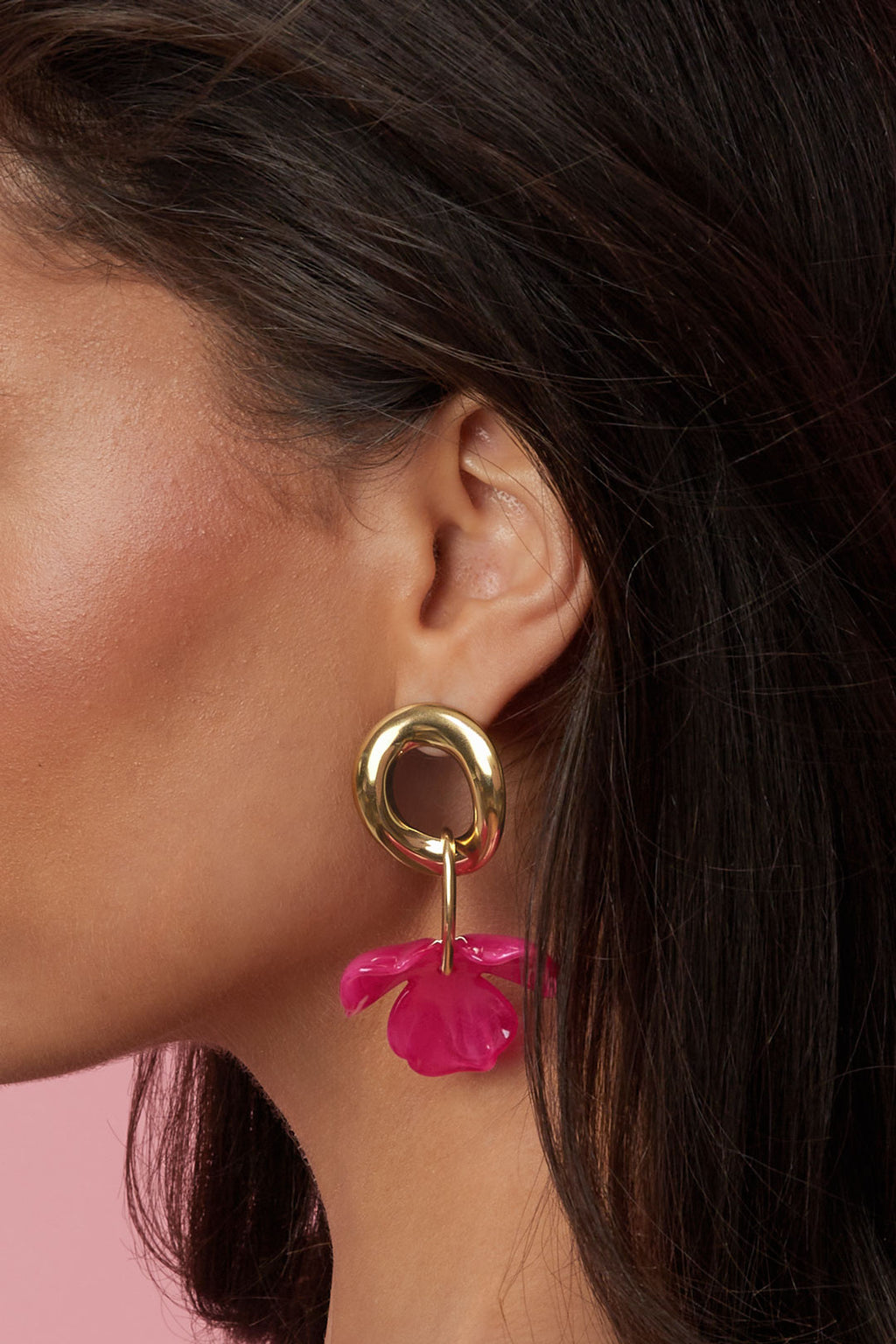 Ronde oorbellen met hangende bloem