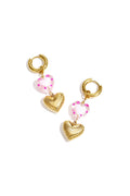 Oorbellen met hartvormige hanger - roze
