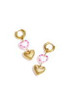 Oorbellen met hartvormige hanger - roze