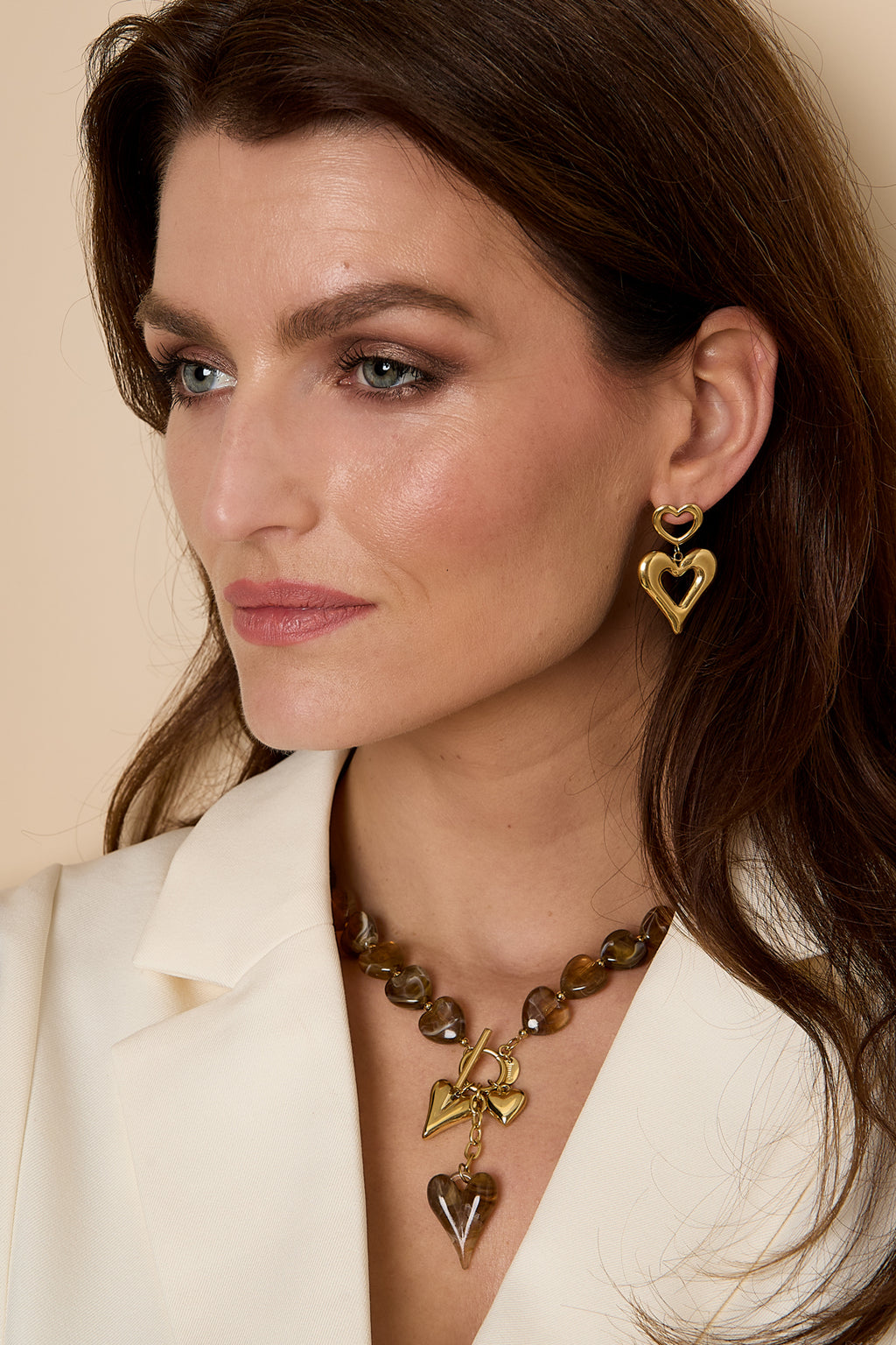 Kralenketting met hangende hartbedeltjes