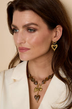 Kralenketting met hangende hartbedeltjes