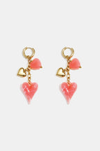 Oorbellen met hangende harten aan ketting
