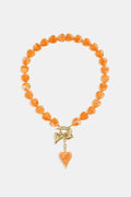 Kralenketting met hangende hartbedeltjes - oranje